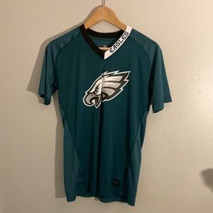 Brand new never worn Eagles short sleeve